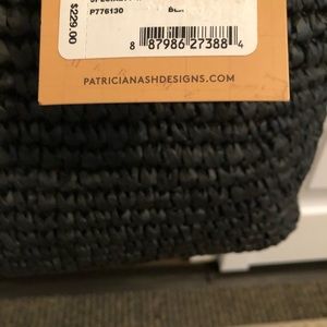 Beautiful NWT black straw Patricia Nash bag.
